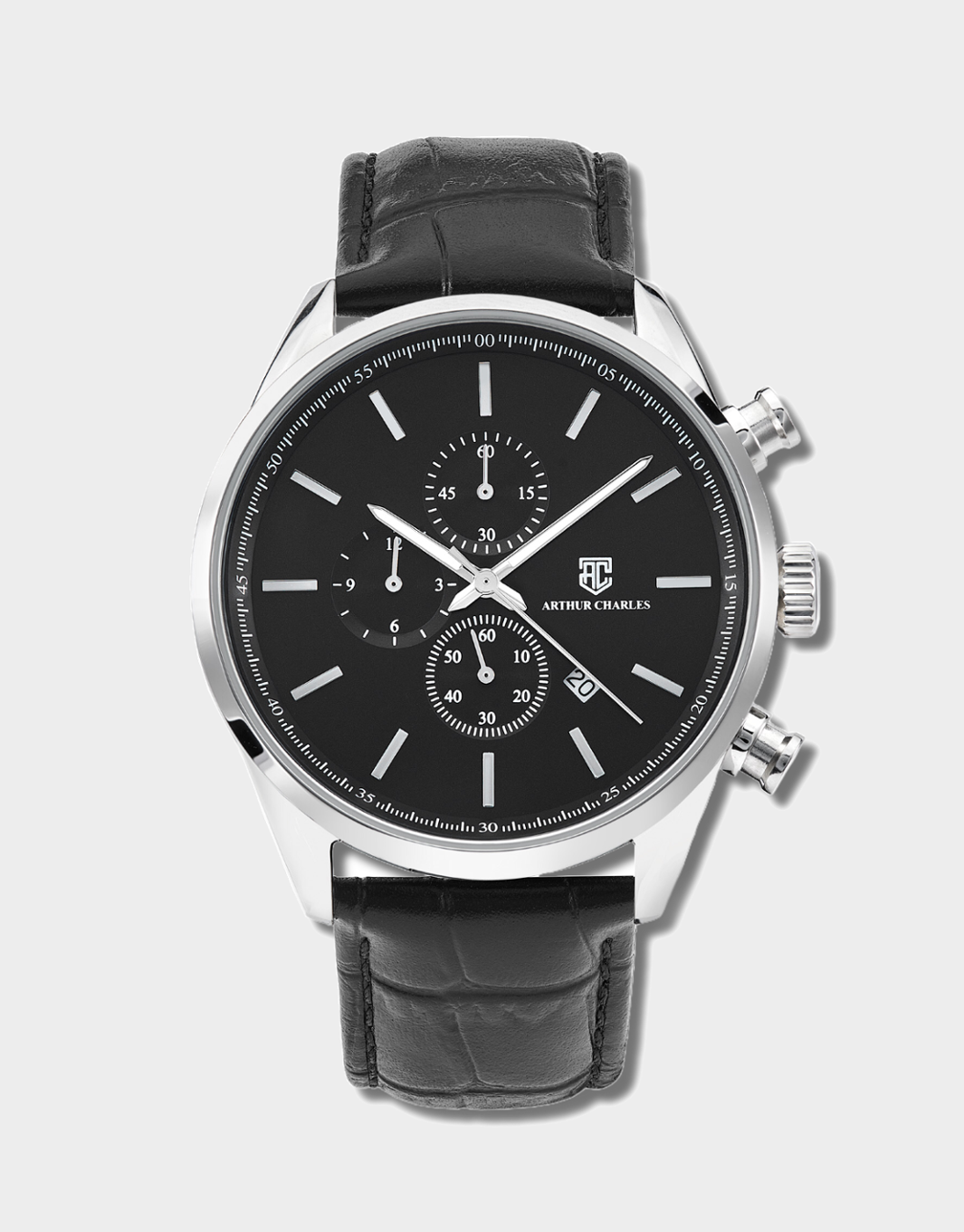 A front view of the men's Silver Chrono Prestige Watch by Arthur Charles. This watch has a black face with a silver dial and hands. The Arthur charles logo is displayed on the front and is also etched upon the crown. This timepiece features a chronograph movement.